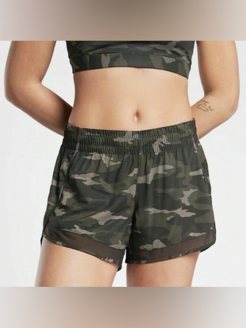 Athleta women’s size small printed mesh racer run shorts in camo lux